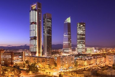 madrid, spain financial district skyline at twilight. 