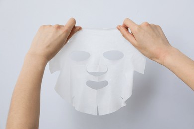 concept of face and skin care with cosmetic mask