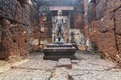 ancient khmer architecture. huge carved buddha of bayon temple at angkor wat complex, siem reap, cambodia