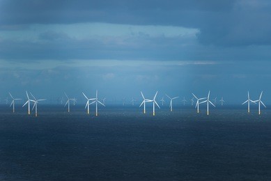 wind generators in irish sea, during rain and storm.