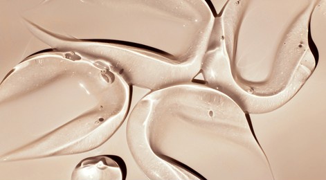 texture gel serum on beige background