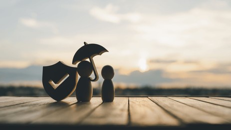 shield protect icon and family model with umbrella, security protection and health insurance. the concept of family home, protection, health care day, car insurance.