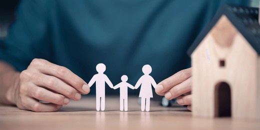 men showing protection and safety protection give a paper doll ,concept of insurance management planning to ensure both health and financial safety,reducing risks to property and family 