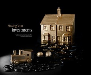 concept image for at risk property investment. creatively lit gold house and dice against a black background. copy space.