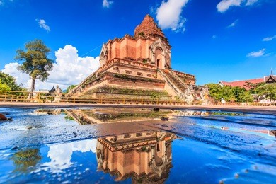ancient pagoda at wat chedi luang temple 700 years in chiang mai, asia thailand, they are public domain or treasure of buddhism, no restrict in copy or use 