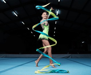 girl, portrait and gymnast with ribbon for practice during competition with creative exercise. dancer, happy and gymnastics string for sports with woman for training with energy for healthy body.