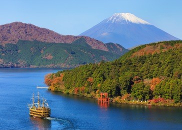 mountain fuji and lake ashi with hakone temple and sightseeing boat in autumn