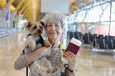 senior woman traveling with her dog 
