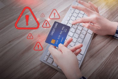 phishing and cyber security: hacker stealing a user's credit card information on a computer