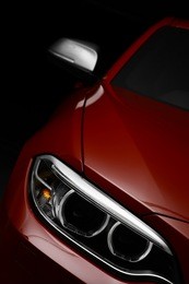 detail on one of the led headlights of a car.