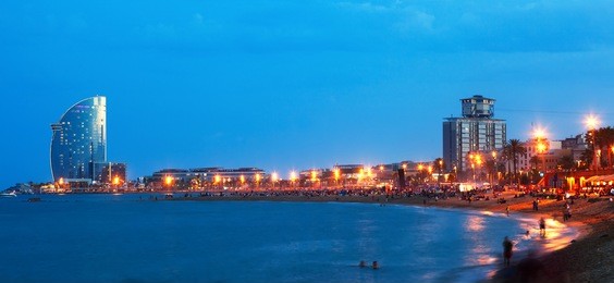 barceloneta beach in summer evening in barcelona, spain