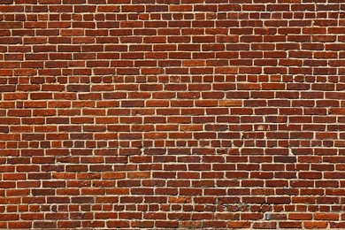 the background of the old red brick wall