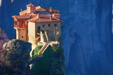 close view on the holy rosanou monastery on the cliff in meteora mountains, greece
