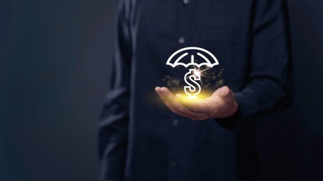 secure financial future, businessman protecting investments strategic shield businessman safeguards investments with care. a portrait of management, security, and financial strength.