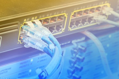 network switch and utp ethernet cables in data center