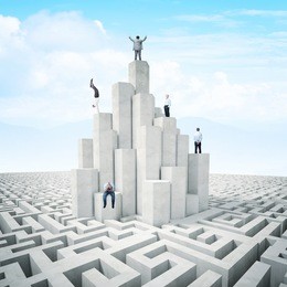 business people on abstract 3d tower with maze