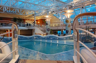 empty indoor pool in modern cruise ship
