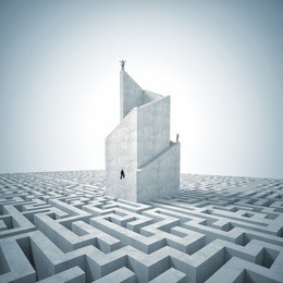 business people on 3d abstract tower with maze