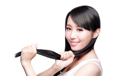 beautiful woman touch her health long straight hair care with smile face, asian beauty model
