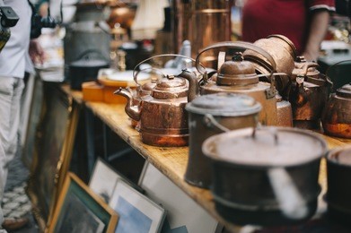 antique pans and pots at the street market in sweden