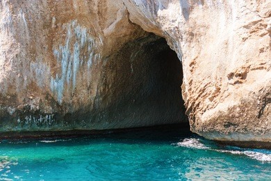 big sea cave in the mediterranean coast. sardinia, italy.