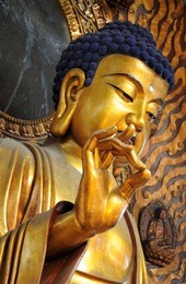 famous giant seated buddha at lingyin temple, hangzhou, shandong province