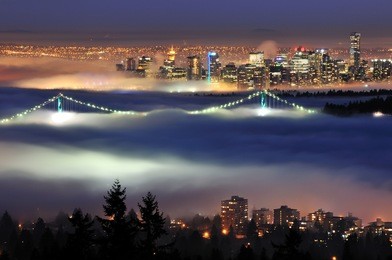 downtown vancouver with evening fog viewed from cypress mountain