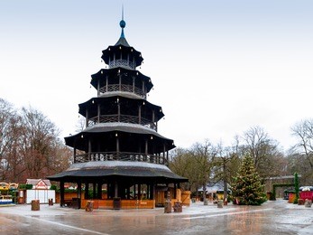 the chinese tower is a wooden structure in the english garden, a large public park in munich, germany