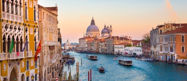 gorgeous view of the grand canal and basilica santa maria della salute during sunset, venice, italy. 