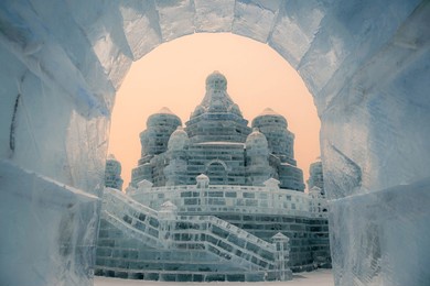 january 1, 2022, harbin, china. ice building in close up during the sunset. harbin ice and snow world. located in harbin, heilongjiang, china.