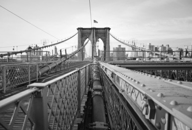 sunrise on the brooklyn bridge.