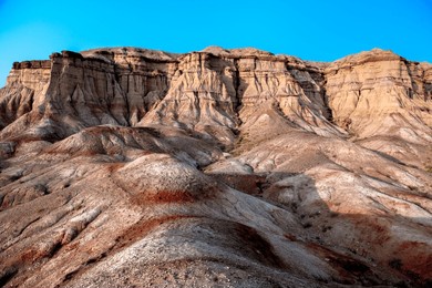 rocky landscape with steep walls in the "white stupa" or in mongolian "tsagaan suvraga" in the gobi desert, mongolia, central asia