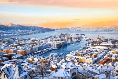 amazing view of bergen harbor in winter at sunrise, norway