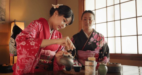 japanese, friends or kimono for tea ceremony in chashitsu with peace or custom tradition. women, temae or vintage style dress or conversation with culture, fashion or honor with antique crockery