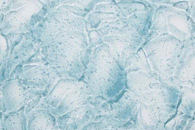 clear gel serum texture. liquid skincare cream background. cosmetic gel product with bubbles close up