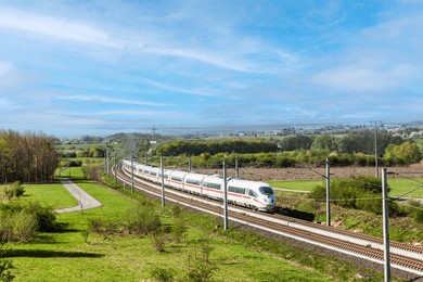 high speed train with full speed in landscape
