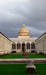 cemetery cloister of the cathedral in a cloudy day, pisa, tuscany, italy