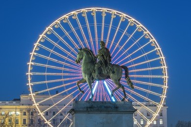 place bellecour statue of king louis xiv by night, lyon france 