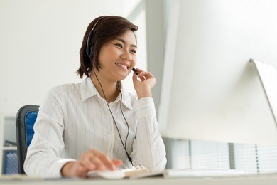 vietnamese customer service representative working in the office