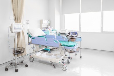 hospital room with beds and comfortable medical equipped in a modern hospital