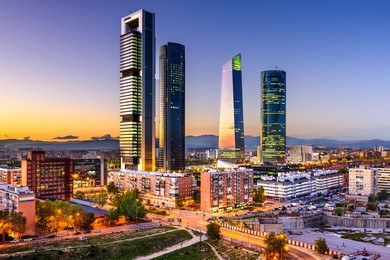 madrid, spain financial district skyline at twilight.