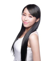 beautiful woman with her health long straight hair care and smile to you, asian beauty model