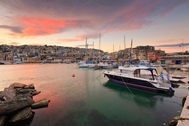 sunset in mikrolimano marina in athens, greece.