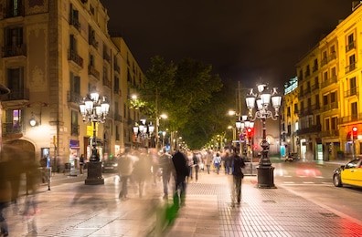 night view of la rambla street at the heart of barcelona, spain