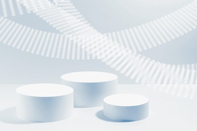 set of three round blue podiums mockup for cosmetic products, dotted neon light wave on blue background. scene for presentation products, gifts, goods, advertising, design, sale, text in modern style.