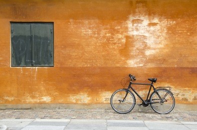 bicycle against bright wall in copenhagen