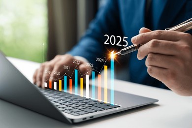businessman analyzes business goals and growth in 2025, planning and vision for 2025, planning business opportunities and strategies, revenue, profits, global economic trends.