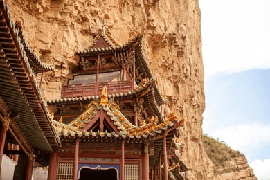 hengshan hanging temple, hanging monastery, is a temple built into a cliff near mount heng in hunyuan county, datong city, shanxi province, china.