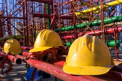 yellow hardhat on construction site