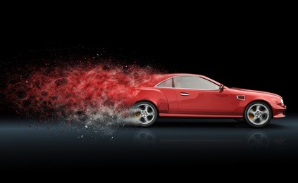 red sport coupe with trail of dust